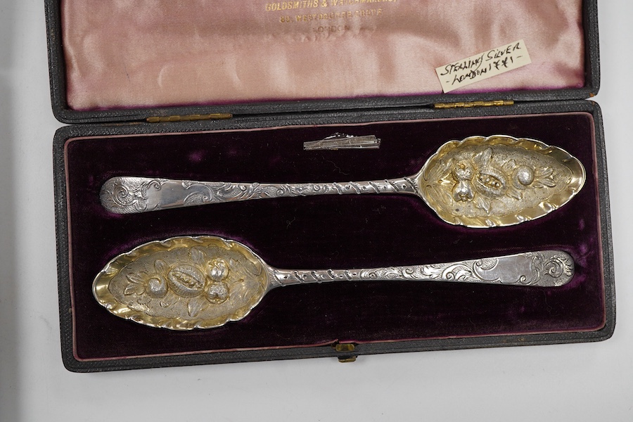 A matched pair of George III silver berry spoons, Dublin, 1808/9, one maker Kelly, the other John Power, 21.5cm, in later fitted case, together with a cased pair of George III Old English pattern berry spoons, London, 17